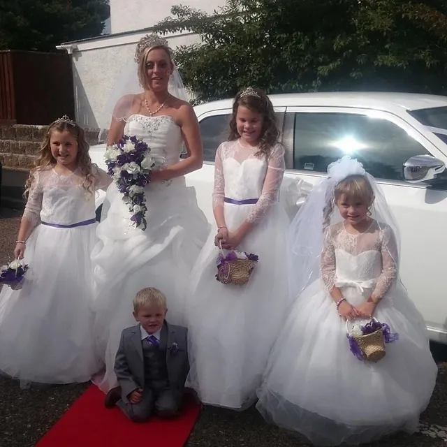 A bride posing near our baby bentley