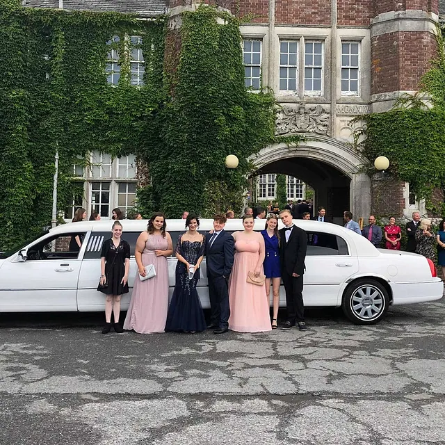 kids arriving to prom in our limo